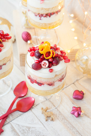 Trifle with white chocolate mousse, pomegranate and orangeの写真素材