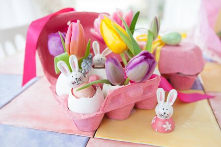 Colorful decorations and fresh flowers for a happy easter