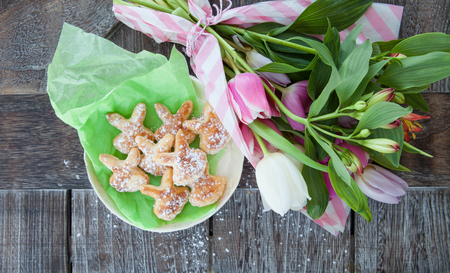 Little easter bunny  cookies  and a bunch of spring flowers