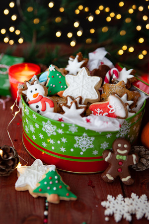 Festive cookie jar with beautifully decorated Christmas cookiesの写真素材