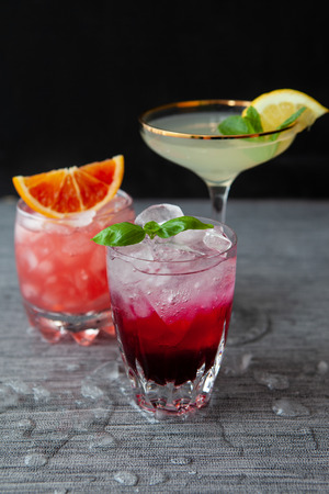 Variety of colorful cocktails and longdrinks on iceの写真素材