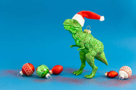 Kitschy T-Rex christmas ornaments for the holidays, Santa hat