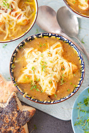 French onion soup with bread and melted cheeseの写真素材