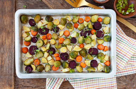 Oven roasted winter vegetables with fresh herbsの写真素材