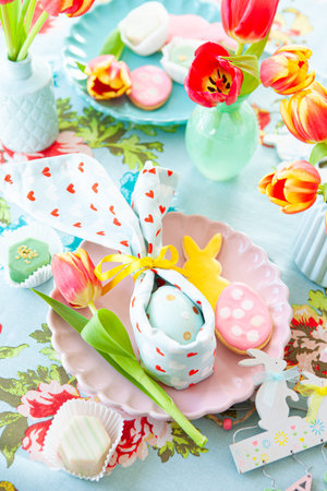 Colorful table setting with sweets for Easterの写真素材