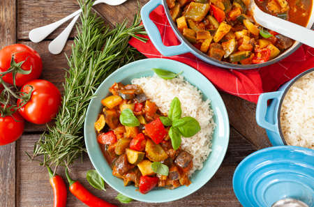 Delicious ratatouille with fresh vegetables and herbsの写真素材