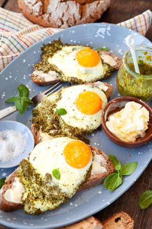 Pesto eggs, eggs, fried in basil pesto, sunny side upの写真素材