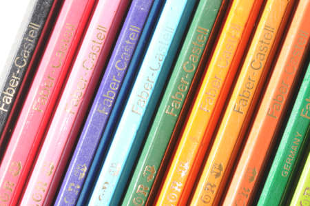 Colorful and funny arrangement of a set of pencils and ink potsの写真素材