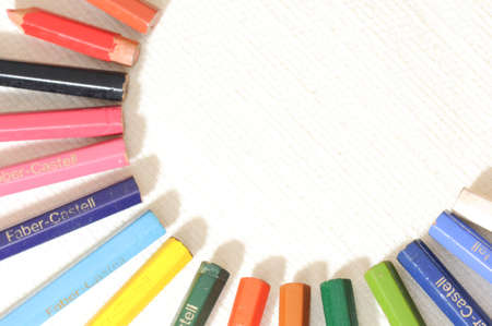 Colorful and funny arrangement of a set of pencils and ink potsの写真素材