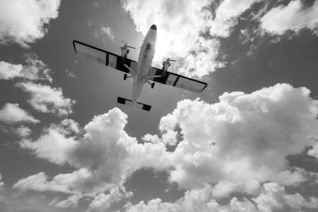 Small plane taking off on the tourist Maho beach in Sint Marteen, Netherlands Antillesの写真素材