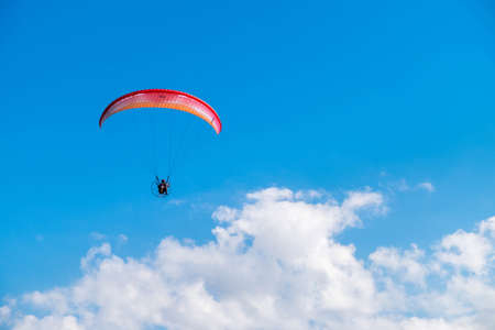 Parasailing over Las Flores Beach, on a very hot day during the summer at Maldonado, Uruguay.の写真素材