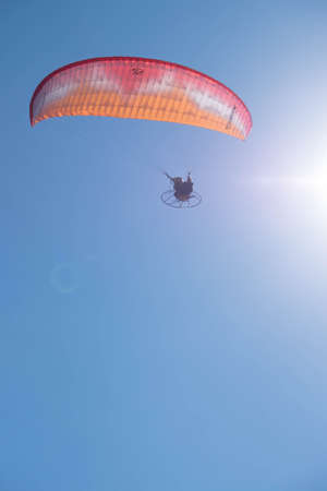 Parasailing over Las Flores Beach, on a very hot day during the summer at Maldonado, Uruguay.の写真素材