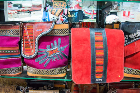 Details of peruvian handcrafted bags at a local market in Cusco, Peruの写真素材