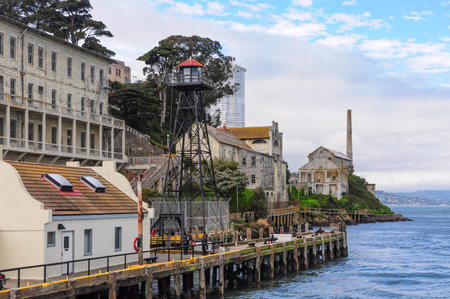 San Francisco, CA, USA. April 22, 2012: Historic Alcatraz Island buildings along the San Francisco Bay shoreline.の写真素材