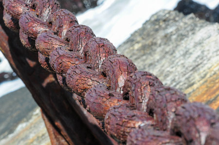 Rusty chain links aged by time, highlighting beauty and texture