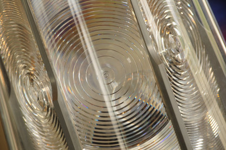 Close-up of glass lens patterns creating mesmerizing optical illusionsの写真素材