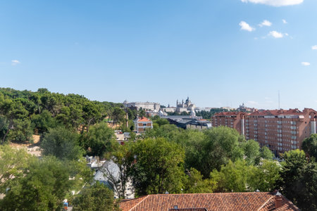 Madrid, Comunidad de Madrid, Spain. August 28, 2022: Panoramic view of Madrid's cityscape, featuring lush greenery and historic architecture.の写真素材