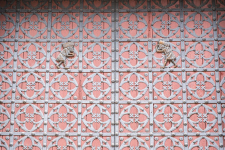 Ornate pink white wall with geometric and floral patternsの写真素材