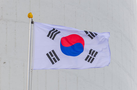 South Korean flag on gray background symbolizing peace and balance