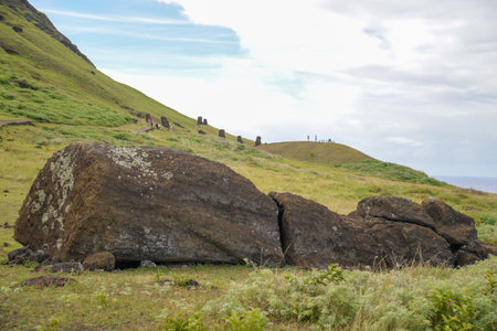 Rano Raraku's moai statues on Easter Island under cloudy skyの写真素材