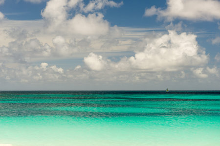 Shoal Bay East: Clear Waters and Vibrant Horizon