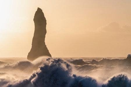 Sunset at Reynisfjara, one of the most famous rocks in Iceland.の写真素材