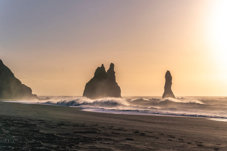 Sunset at Reynisfjara Beach, one of the most beautiful beaches in Icelandの写真素材