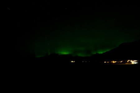 Aurora borealis in the night sky. Northern lights.の写真素材