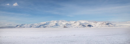 Panoramic view of the snow-capped mountains of Iceland glacierの写真素材