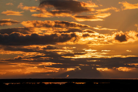 colorful dramatic sky with cloud at sunset. closeup of photoの写真素材