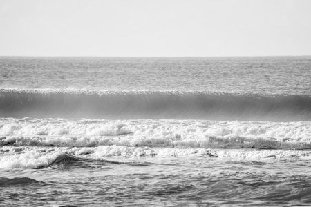 Black and white image of the waves on the Atlantic Ocean. Toned.の写真素材