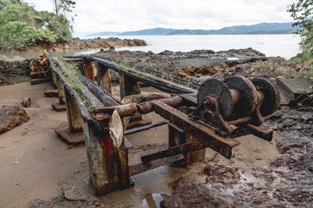 Old rusty bridge on the shore of the sea in Sri Lanka.の写真素材