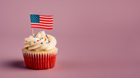 Patriotic cupcake with american flag on top over pink backgroundの素材