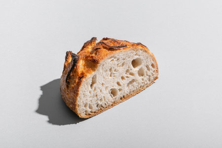 loaf of bread on a white background, close-up.
