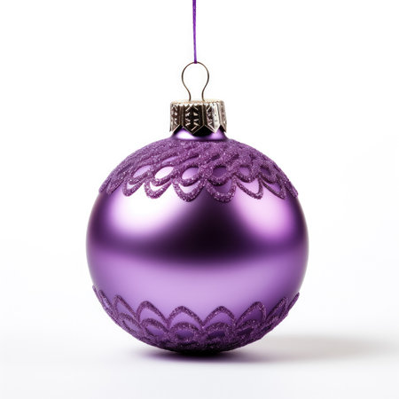 Purple Christmas tree ornament isolated on white backgroundの素材