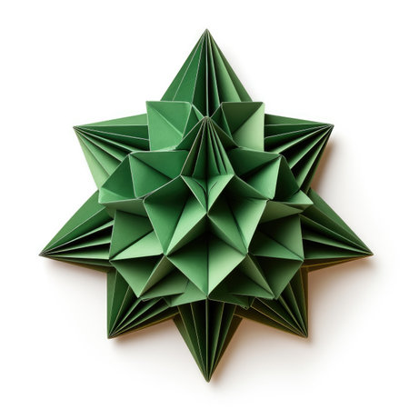 Handcrafted Christmas tree origami ornament isolated on white backgroundの素材