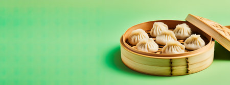 A close-up shot of a bamboo steamer filled with freshly steamed dumplings on a vibrant gradient backgroundの素材