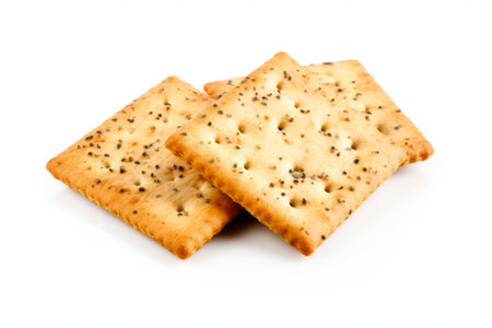 Crackers with sesame seeds isolated on white background, clipping path includedの素材