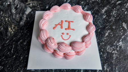 Top down view of a festive circular cake with pink frosting and AI inscription, ideal for technology...