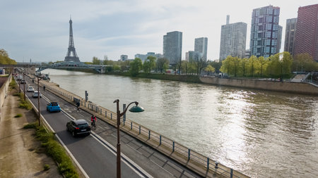 Springtime in Paris, France, with a clear view of the Seine River and Eiffel Tower, cityscape and traffic on April 14th, 2024, ideal for travel and culture themesのeditorial素材