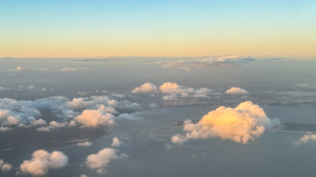 Ethereal sunset clouds drift over a whispering horizon, invoking the serene Tanabata Festivalの写真素材
