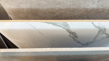 Marble veins dance on sleek tiles, whispering of Italian craftsmanship and the serene elegance of...