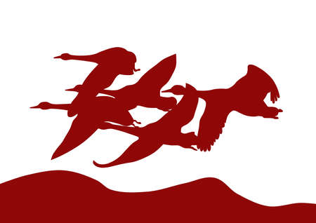 flock of geeseGeese fly over a mountain range at sunsetの写真素材