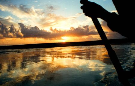 Rising sun on the beach of Troncoso, Brazil.