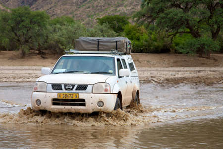 Crossing of a river by 4x4 in Namibia - Kaokolandのeditorial素材
