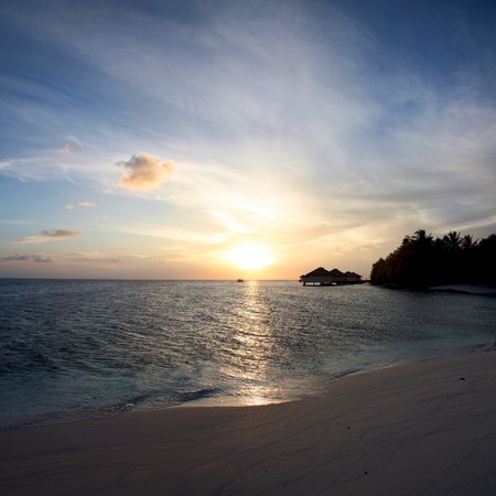 Sunrise early in the morning on the beach of Embudu in the Maldivesの写真素材