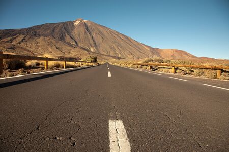 The open road to leading to the Volcano Teide on Tenerife island.の写真素材