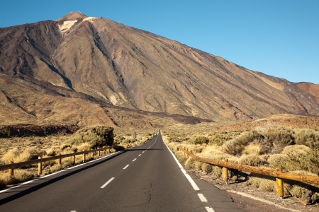 The open road to leading to the Volcano Teide on Tenerife island.の写真素材