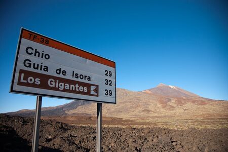 Teide in the beautiful landscape of the national park - With sign road towards the Los Gigante sightseenのeditorial素材