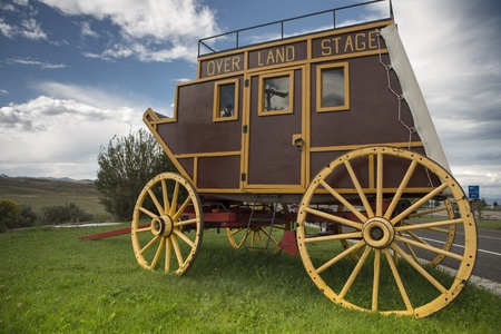 Wild West covered wagon in prairie along the road in Utahの写真素材